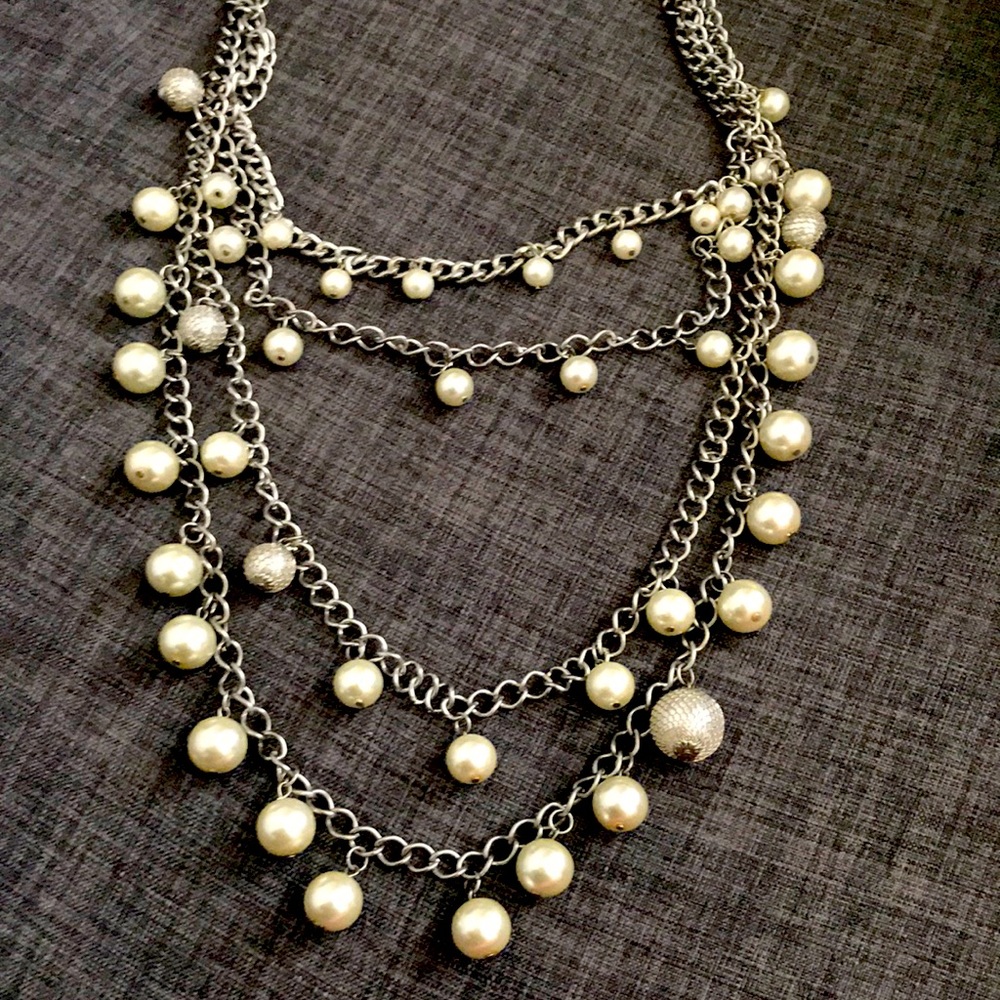 Jewlrey necklace. All connected. Silver chain with white and silver balls. 18”